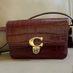 Coach Burgundy Crossbody Bag with Gold Hardware
